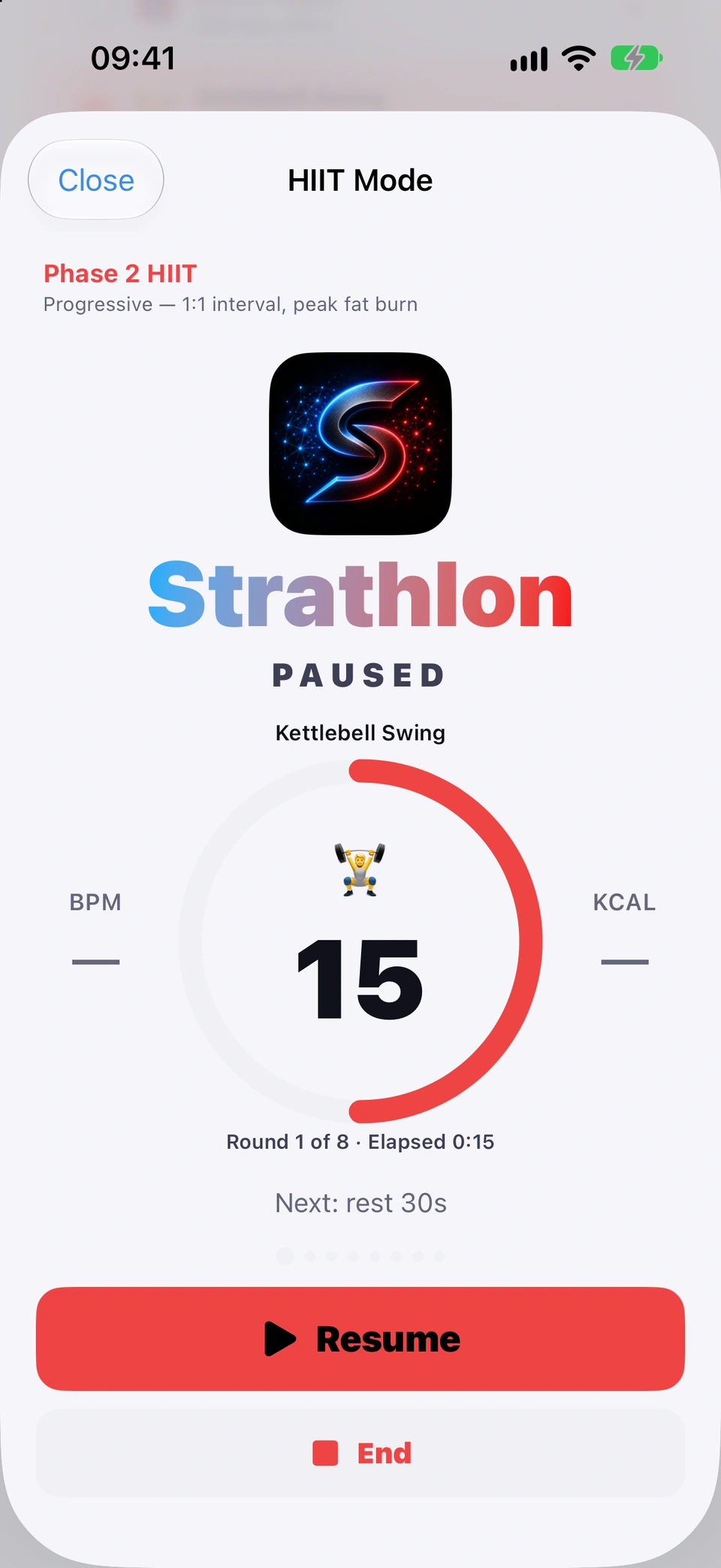 HIIT Mode paused part-way through a Phase 2 HIIT: PAUSED on Kettlebell Swing with 15 seconds left in the interval, Round 1 of 8 · Elapsed 0:15, dashes for heart rate and calories, Next: rest 30s, and the Resume and End buttons.