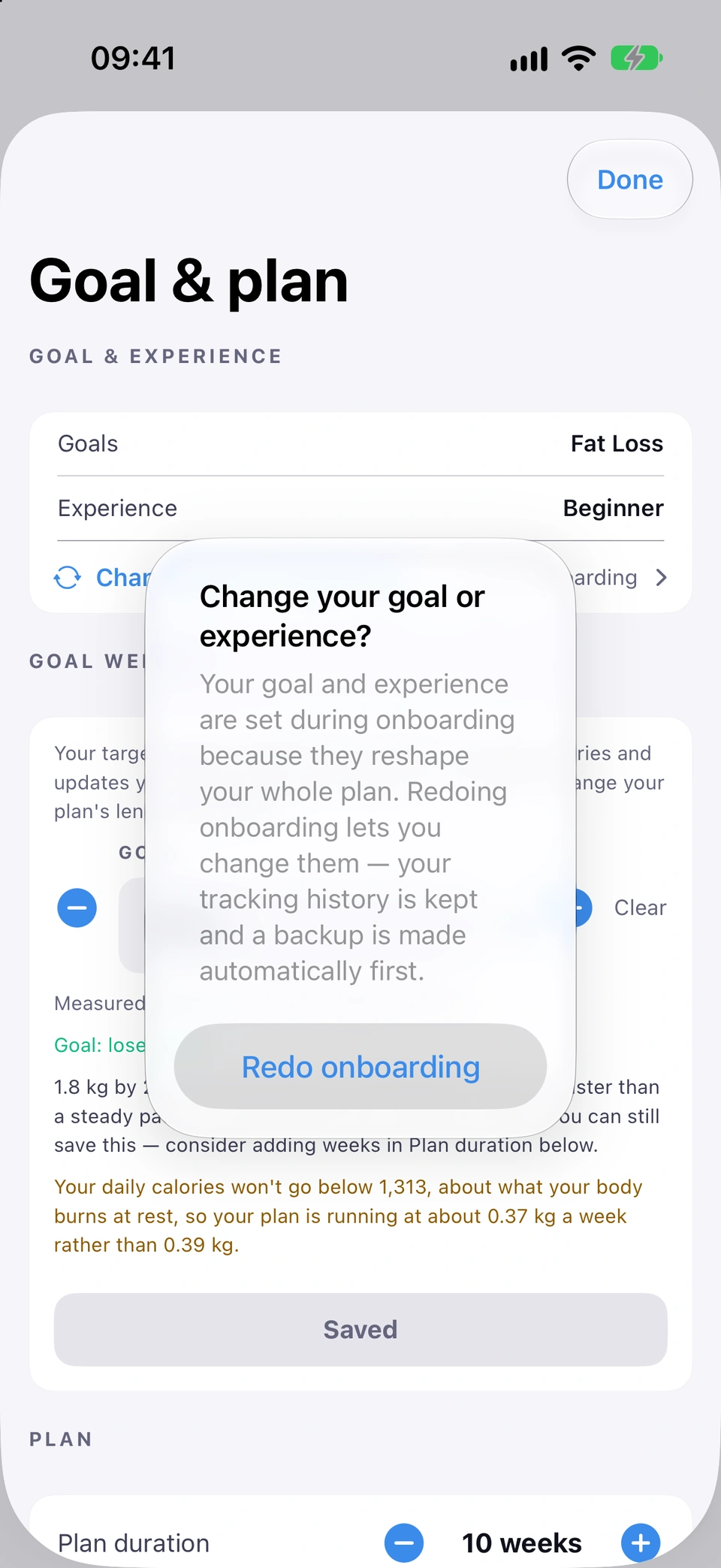 The Goal & plan sheet with the Change your goal or experience? prompt open over it: your goal and experience are set during onboarding because they reshape your whole plan, redoing onboarding lets you change them, your tracking history is kept and a backup is made automatically first, with the Redo onboarding button.
