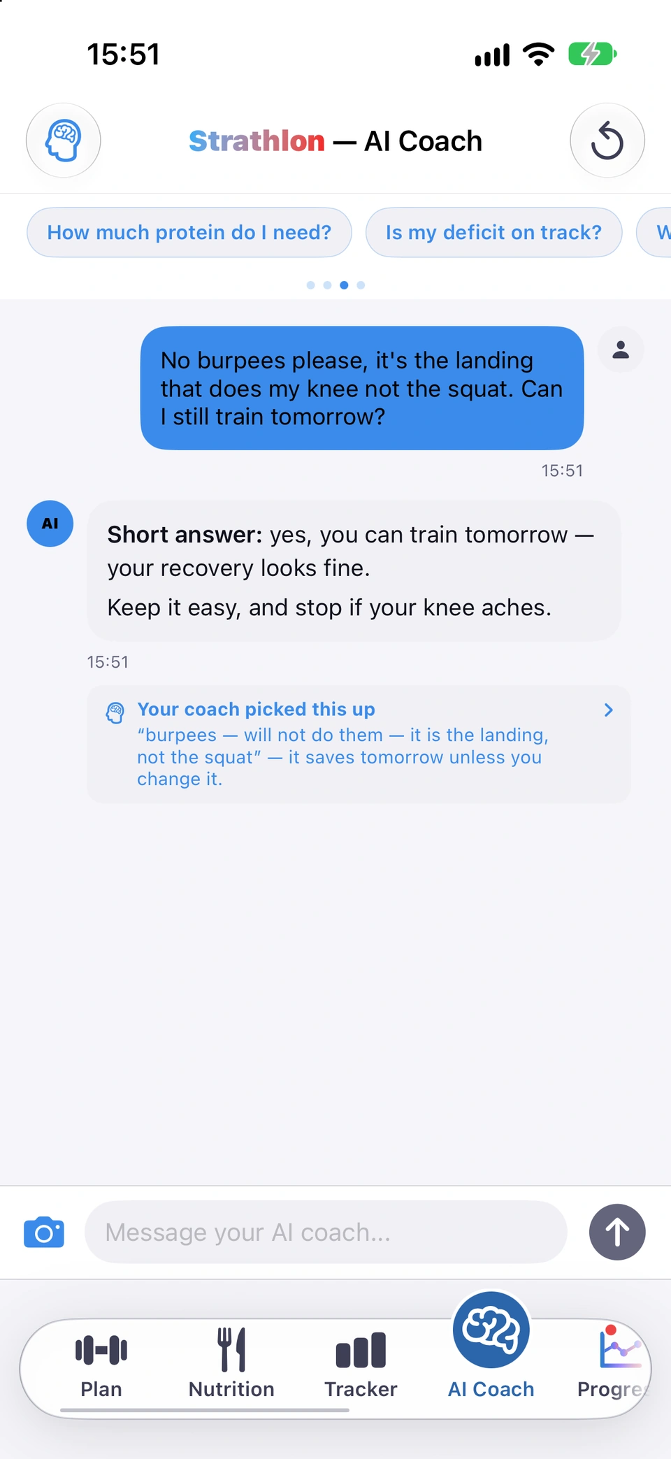 The AI Coach chat: the message No burpees please, it's the landing that does my knee not the squat. Can I still train tomorrow?, the coach's answer, and under it the line Your coach picked this up, quoting burpees — will not do them — it is the landing, not the squat, and saying it saves tomorrow unless you change it.