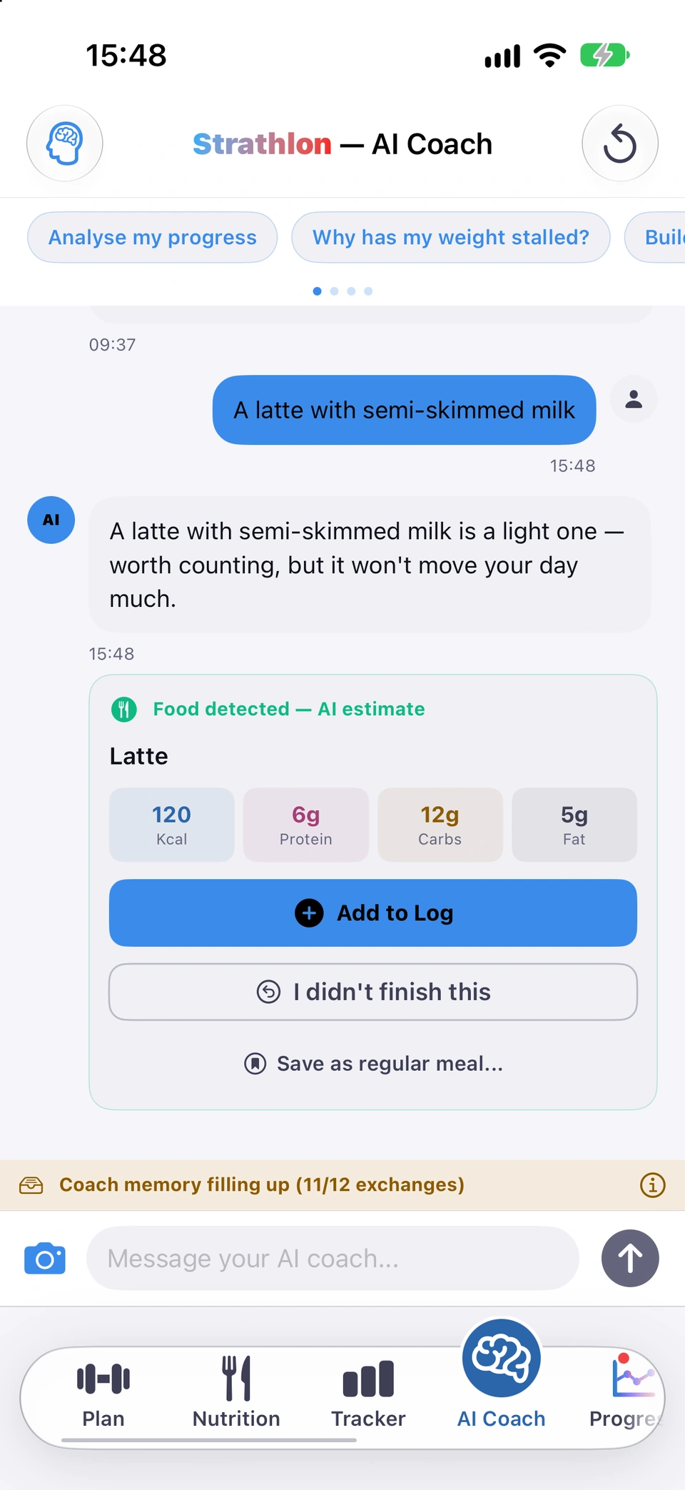 The AI Coach tab: a message about a latte and the coach's food card for it, and just above the message box an amber banner reading Coach memory filling up (11/12 exchanges) with an info button.