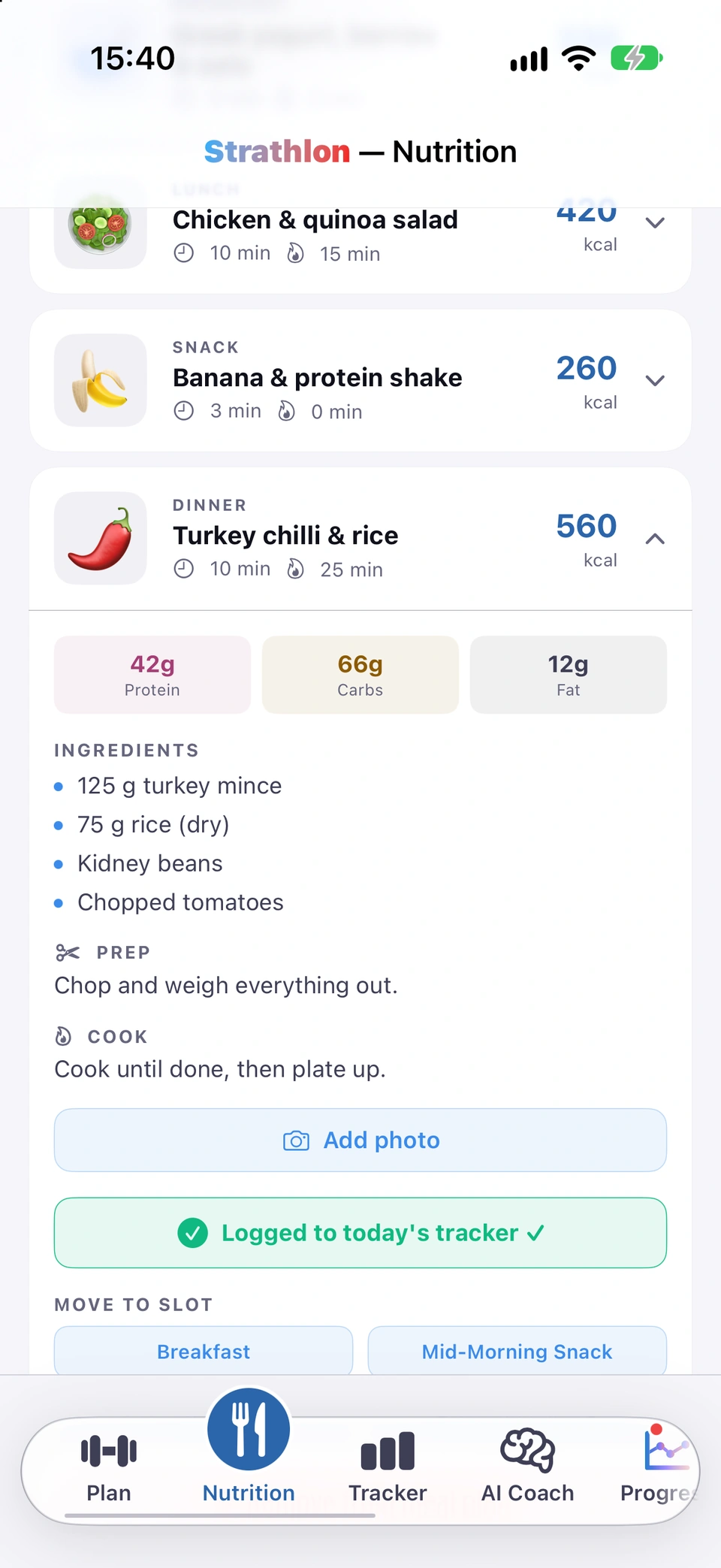 An expanded Turkey chilli & rice dinner card on the Nutrition tab after Add to Today's Log: its protein, carbs and fat, ingredients and steps, the button now reading Logged to today's tracker ✓, and MOVE TO SLOT below it.