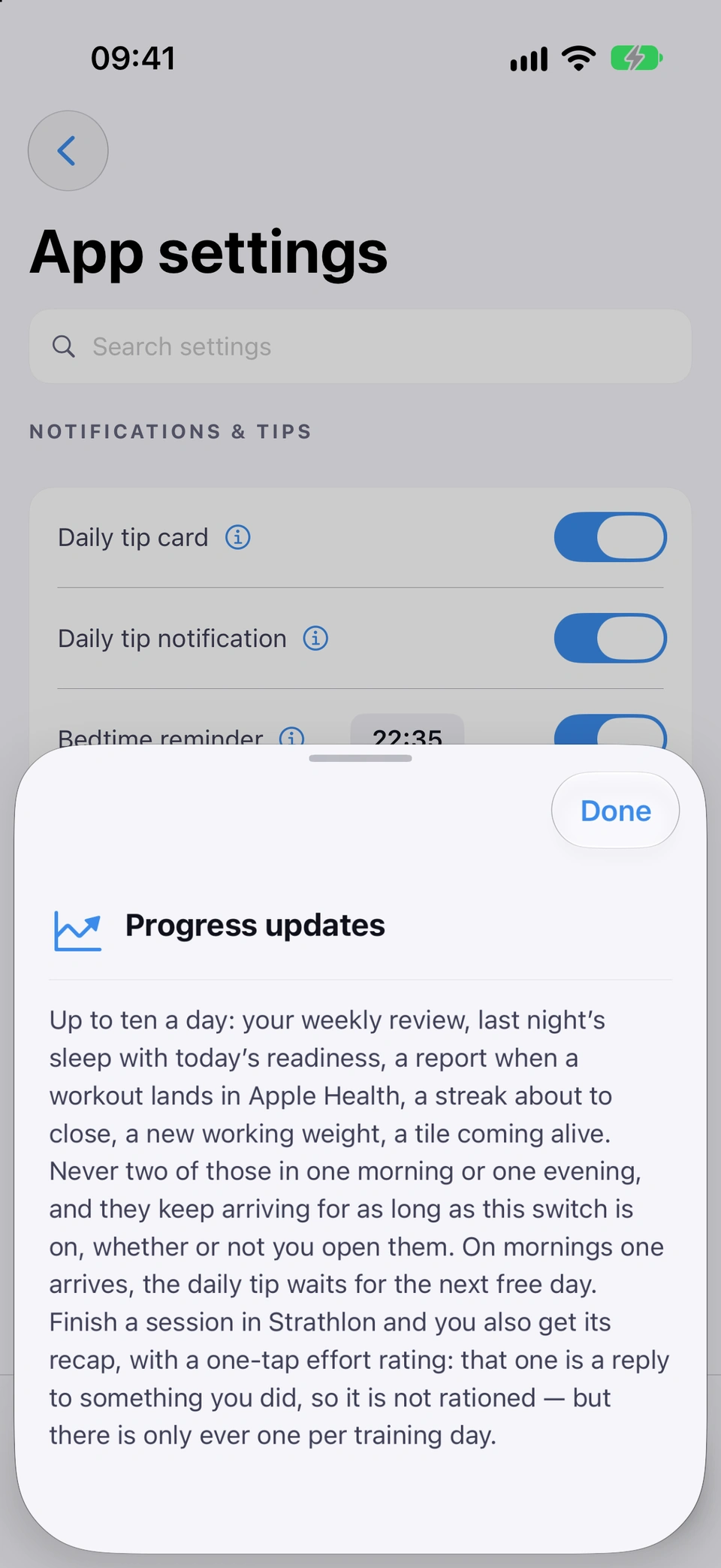 App settings with the information sheet for Progress updates open over it: it lists what the switch sends, up to ten a day, the weekly review, last night's sleep with today's readiness, a workout report, a streak about to close, a new working weight and a tile coming alive, and says they keep arriving for as long as the switch is on.